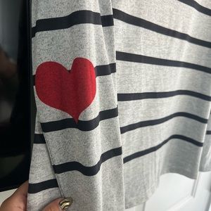 Business casual top, grey top with black strips and red hearts at elbow